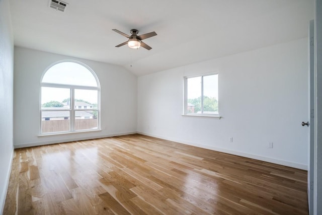 1467 Norfolk Ct, Allen, TX 75002 - unfurnished room featuring plenty of natural light, ceiling fan, lofted ceiling, wood finished floors, and baseboards