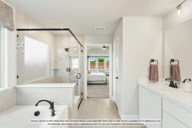 2503 Jennifer Ln, Mansfield, TX 76063 - ensuite bathroom with a garden tub, ceiling fan, a stall shower, vanity, and tile patterned floors