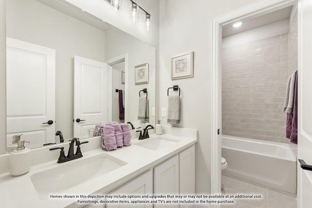 2503 Jennifer Ln, Mansfield, TX 76063 - full bath with double vanity, toilet, tile patterned floors, and tub / shower combination