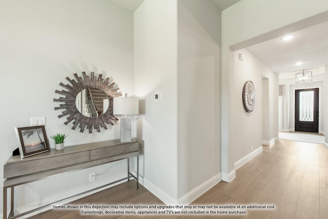 2503 Jennifer Ln, Mansfield, TX 76063 - entrance foyer with wood finished floors, a chandelier, baseboards, and recessed lighting