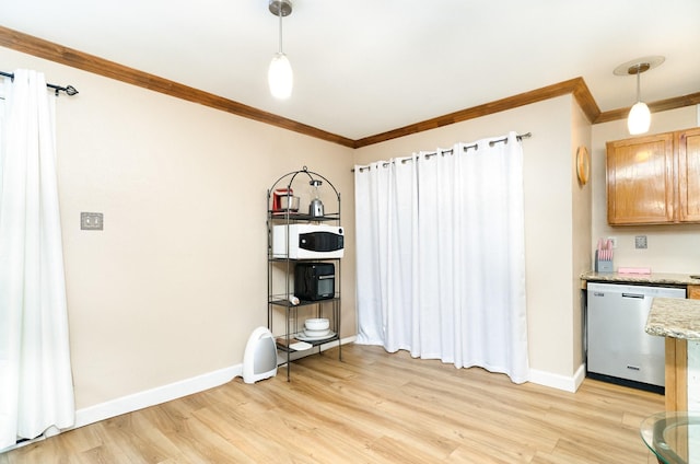 1502 Santa Fe Trl, Grand Prairie, TX 75052 - unfurnished dining area with ornamental molding, light wood finished floors, and baseboards
