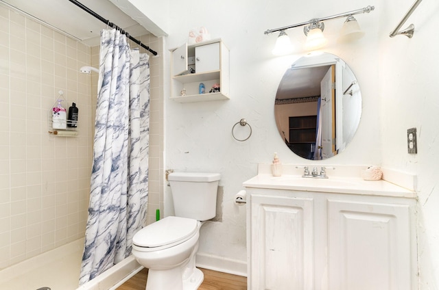 1502 Santa Fe Trl, Grand Prairie, TX 75052 - full bathroom featuring toilet, vanity, tiled shower, and wood finished floors