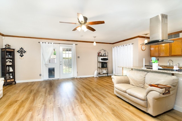 1502 Santa Fe Trl, Grand Prairie, TX 75052 - living area with a ceiling fan, light wood-style floors, ornamental molding, and baseboards