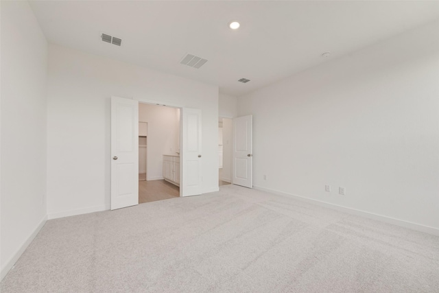 1802 Golden Sq, Cedar Hill, TX 75116 - unfurnished bedroom with light carpet, baseboards, and recessed lighting
