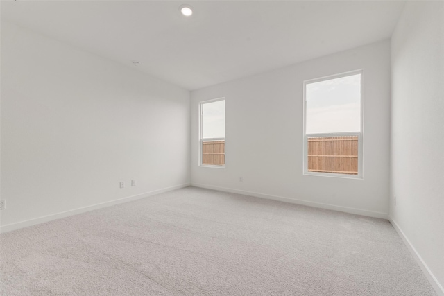1802 Golden Sq, Cedar Hill, TX 75116 - spare room featuring light colored carpet and baseboards