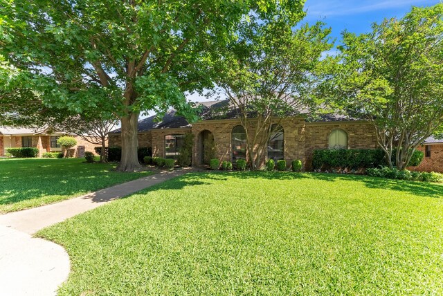 227 Meadowlark Ln, Duncanville, TX 75137 - view of front of property featuring a front yard and brick siding