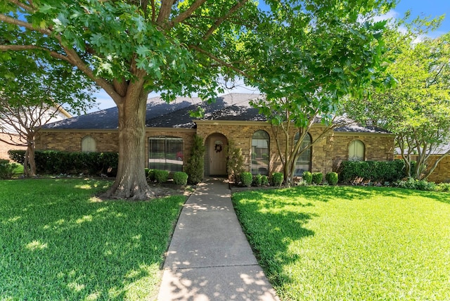 227 Meadowlark Ln, Duncanville, TX 75137 - view of front facade with a front lawn and brick siding