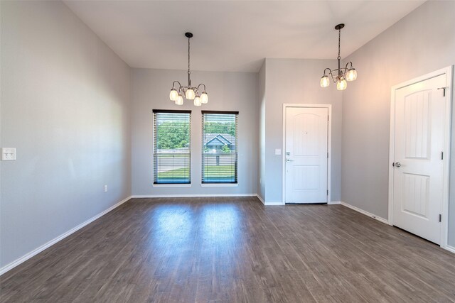 107 Oliver Wendell Ct, Mount Vernon, TX 75457 - entryway with a chandelier, dark wood-style floors, and baseboards