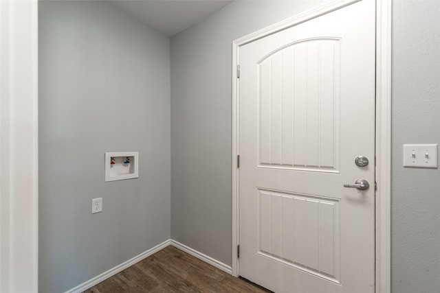 107 Oliver Wendell Ct, Mount Vernon, TX 75457 - laundry room featuring hookup for a washing machine, dark wood-style flooring, and baseboards