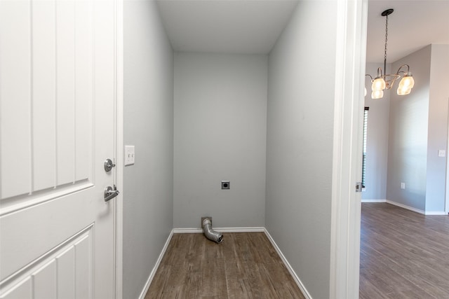 107 Oliver Wendell Ct, Mount Vernon, TX 75457 - laundry room featuring electric dryer hookup, dark wood-style flooring, baseboards, and a chandelier