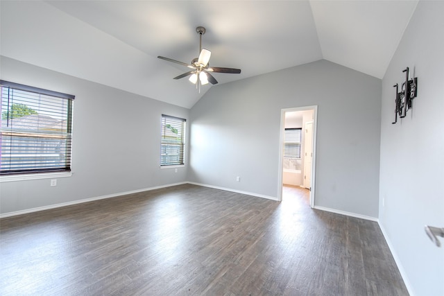 107 Oliver Wendell Ct, Mount Vernon, TX 75457 - spare room featuring ceiling fan, lofted ceiling, dark wood-style floors, and baseboards