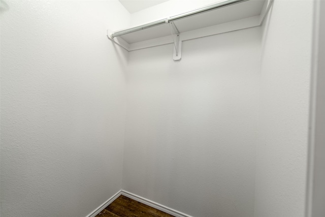 107 Oliver Wendell Ct, Mount Vernon, TX 75457 - walk in closet featuring dark wood-style flooring