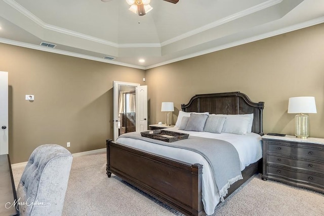 1010 Toledano Cir, Shreveport, LA 71106 - bedroom featuring a tray ceiling, light colored carpet, baseboards, crown molding, and ceiling fan