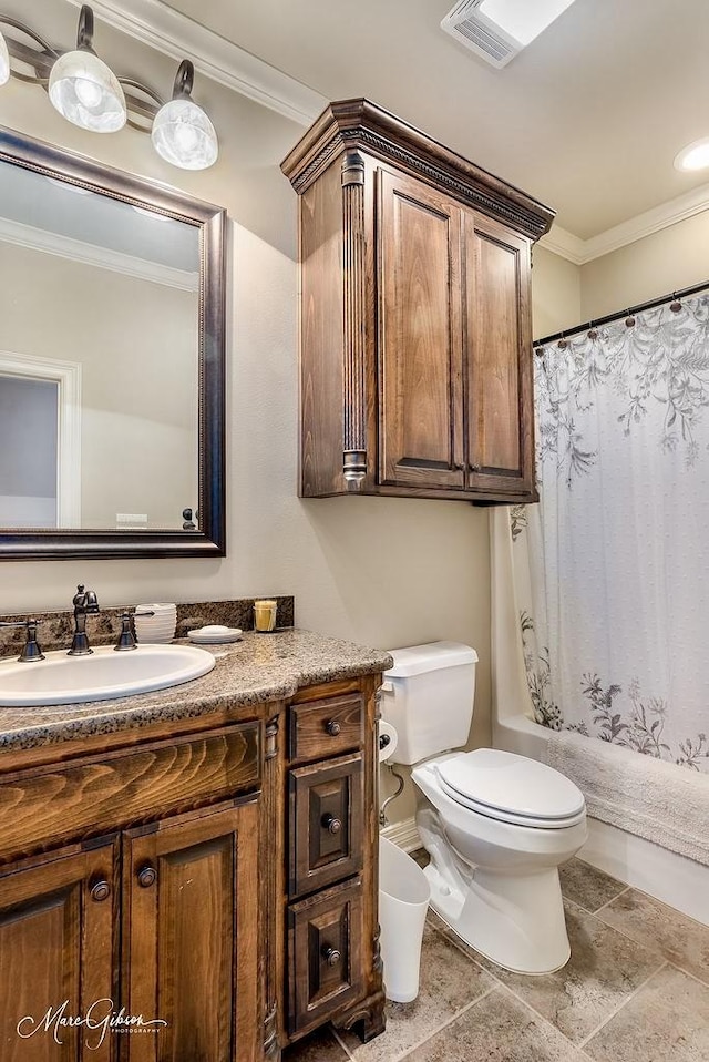 1010 Toledano Cir, Shreveport, LA 71106 - full bathroom featuring vanity, toilet, crown molding, shower / tub combo, and stone finish floors