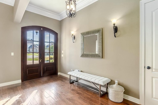 1010 Toledano Cir, Shreveport, LA 71106 - entryway with french doors, arched walkways, baseboards, ornamental molding, and wood finished floors