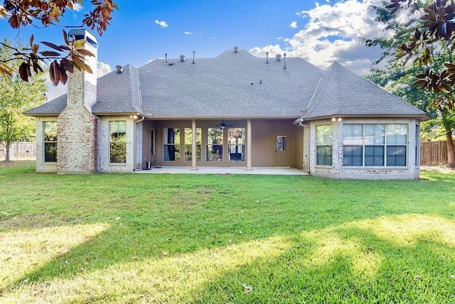 1010 Toledano Cir, Shreveport, LA 71106 - rear view of property with a patio, a shingled roof, and a chimney