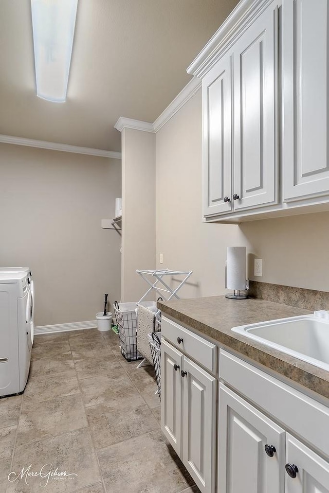 1010 Toledano Cir, Shreveport, LA 71106 - laundry area with cabinet space, crown molding, independent washer and dryer, and baseboards
