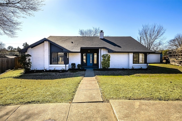 5607 Emrose Cir, Dallas, TX 75227 - view of front of home featuring a chimney, brick siding, and roof with shingles
