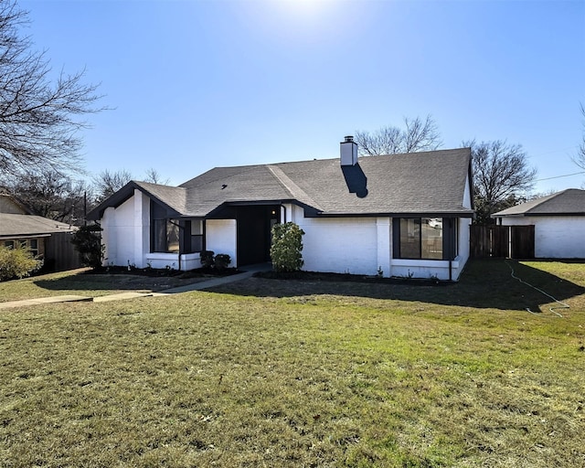 5607 Emrose Cir, Dallas, TX 75227 - view of front of home featuring a chimney and roof with shingles