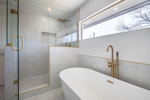 5607 Emrose Cir, Dallas, TX 75227 - full bathroom with a soaking tub, a marble finish shower, and marble finish flooring