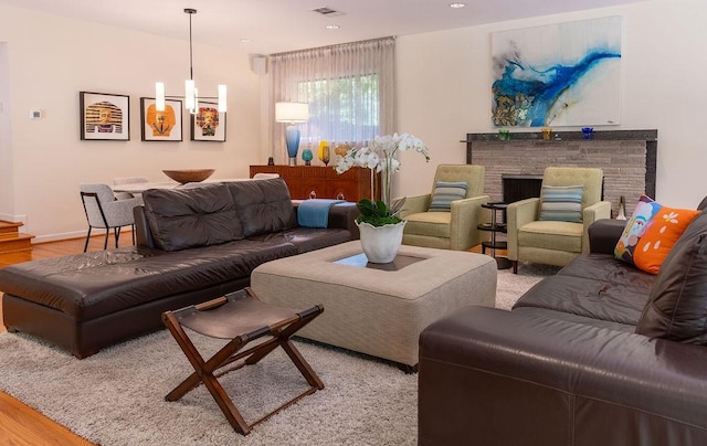 1624 Eastus Dr, Dallas, TX 75208 - living area with wood finished floors and a fireplace