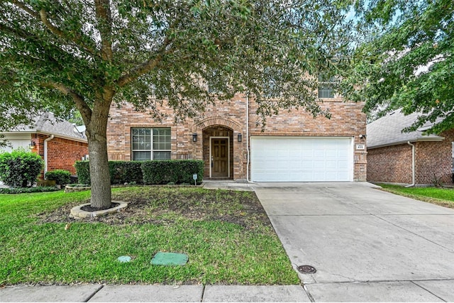 405 Cypress Hill Dr, Mckinney, TX 75071 - view of front of home featuring concrete driveway, brick siding, and an attached garage