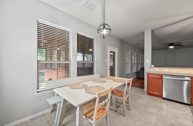 405 Cypress Hill Dr, Mckinney, TX 75071 - dining space with ceiling fan, baseboards, and light tile patterned floors