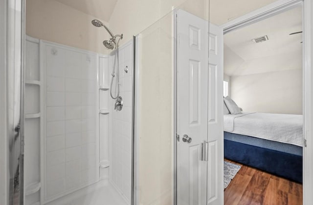 405 Cypress Hill Dr, Mckinney, TX 75071 - bathroom with connected bathroom, a stall shower, and wood finished floors