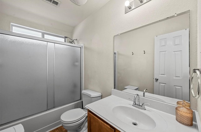 405 Cypress Hill Dr, Mckinney, TX 75071 - full bathroom featuring toilet, vanity, and shower / bath combination with glass door