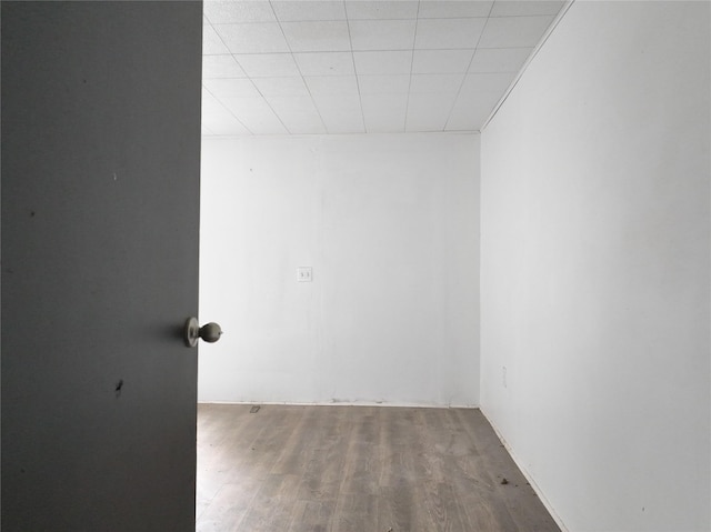 927 London St, Vernon, TX 76384 - empty room with wood finished floors and a paneled ceiling