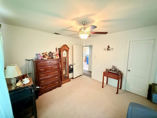 307 Cedar St, Palo Pinto, TX 76484 - carpeted bedroom with a ceiling fan
