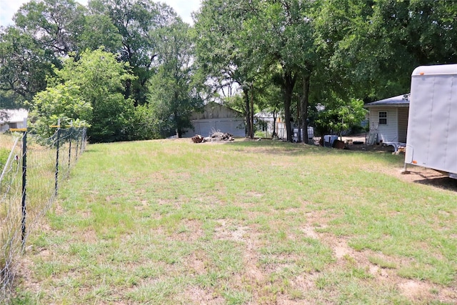 307 Cedar St, Palo Pinto, TX 76484 - view of yard featuring a garage