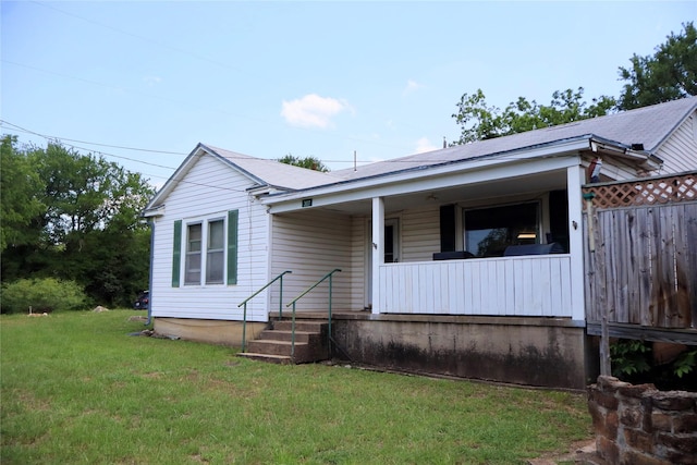307 Cedar St, Palo Pinto, TX 76484 - view of front of house featuring covered porch and a front lawn