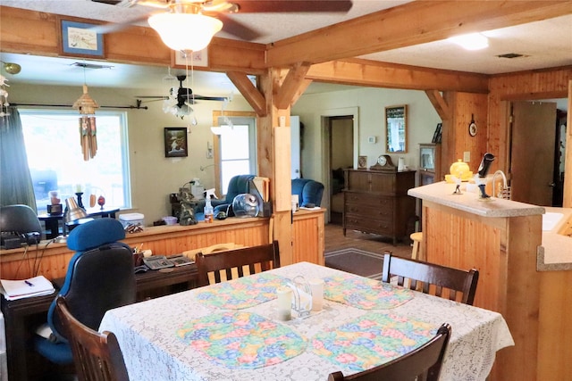 307 Cedar St, Palo Pinto, TX 76484 - dining room with ceiling fan and beam ceiling