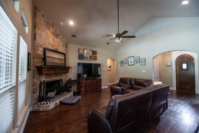 665 Amanda Lee, Combine, TX 75159 - living area with arched walkways, healthy amount of natural light, a ceiling fan, a fireplace, and high vaulted ceiling