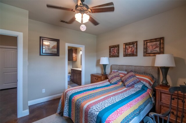 665 Amanda Lee, Combine, TX 75159 - bedroom with baseboards, ceiling fan, ensuite bathroom, and finished concrete flooring