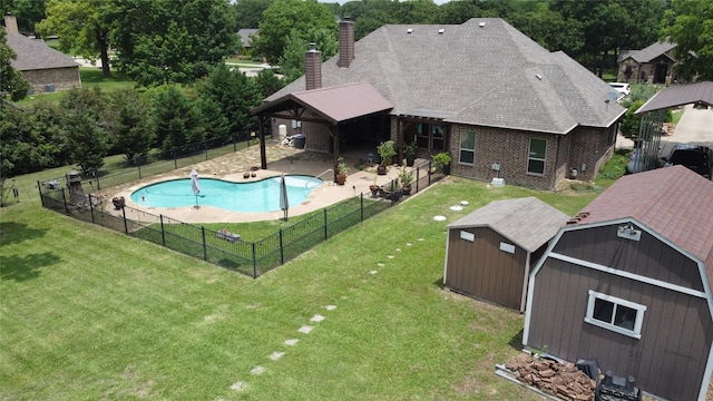 665 Amanda Lee, Combine, TX 75159 - view of swimming pool with an outbuilding and a patio area