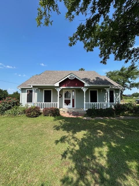 5500 Vz County Road 3415, Wills Point, TX 75169 - view of front facade with covered porch and a front yard