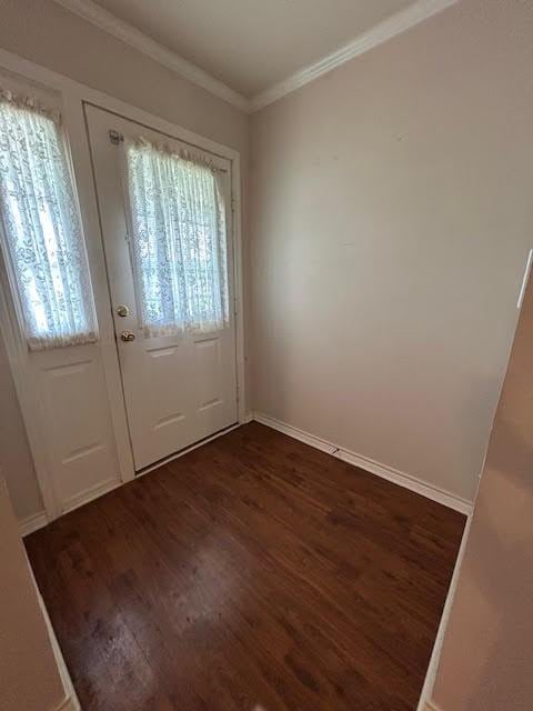 5500 Vz County Road 3415, Wills Point, TX 75169 - doorway to outside featuring dark wood-style floors, ornamental molding, and baseboards