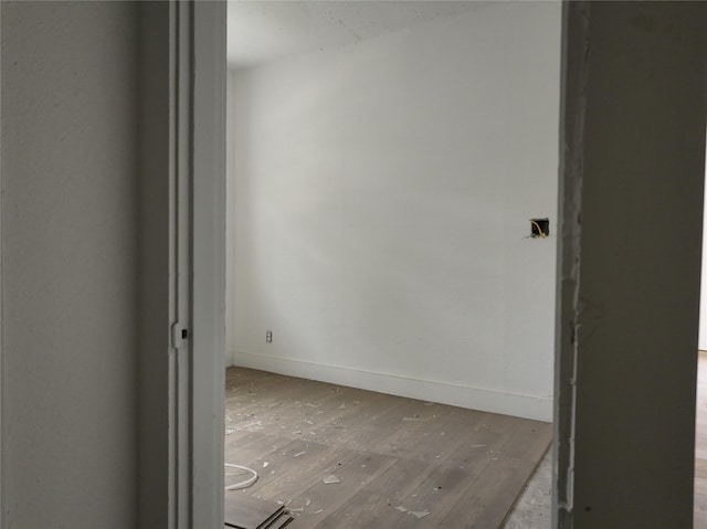 1428 Texas St, Vernon, TX 76384 - empty room with hardwood / wood-style floors and baseboards
