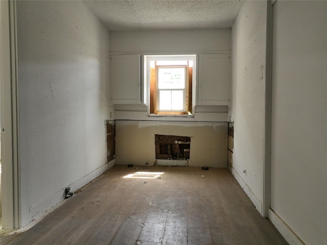1428 Texas St, Vernon, TX 76384 - spare room featuring a textured ceiling