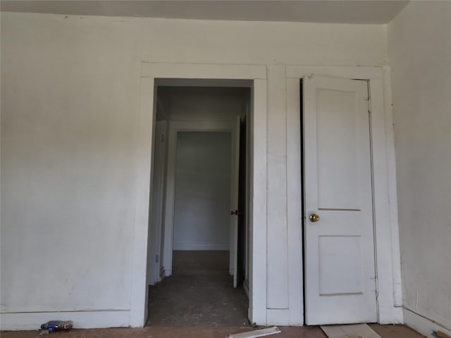 1428 Texas St, Vernon, TX 76384 - corridor featuring unfinished concrete floors