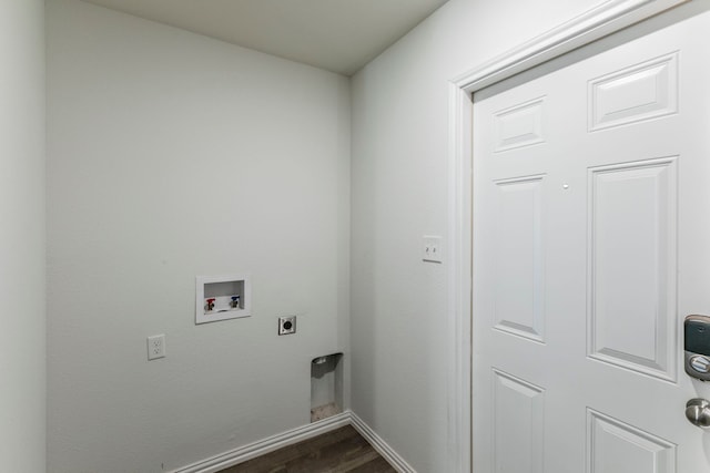 1718 Chestnut St, Abilene, TX 79602 - laundry room featuring dark wood-type flooring, washer hookup, electric dryer hookup, and baseboards