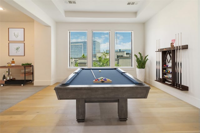 7844 Secluded Ave, Plano, TX 75024 - game room with a tray ceiling, healthy amount of natural light, wood finished floors, and recessed lighting