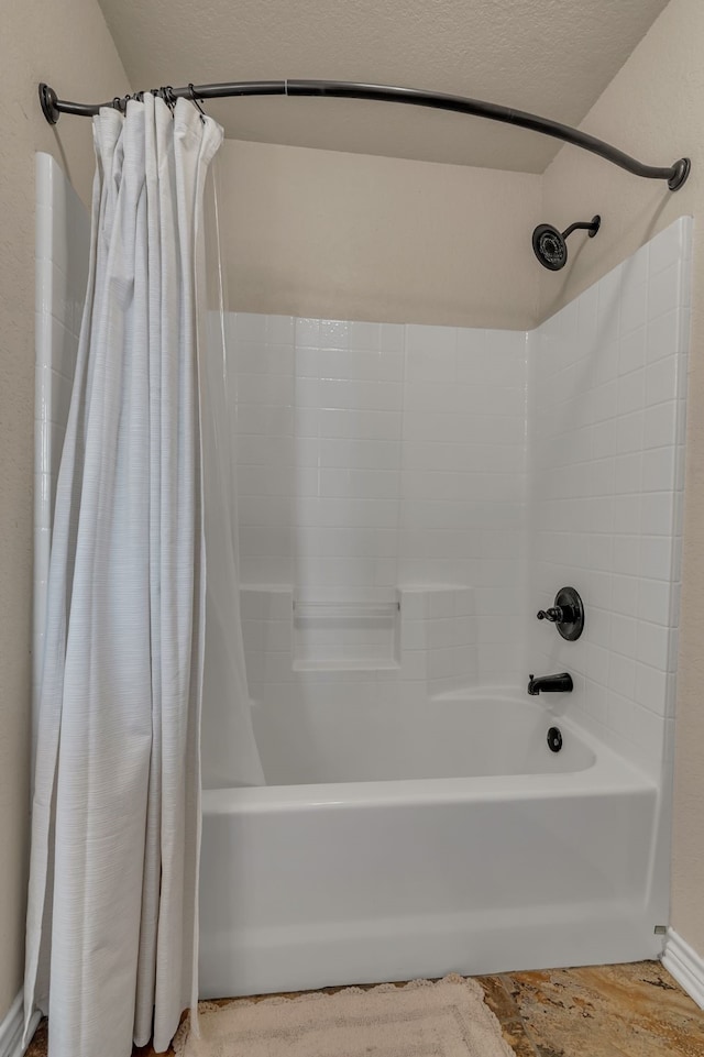111 Ladonna Ct, Decatur, TX 76234 - full bath featuring shower / bath combo with shower curtain and baseboards
