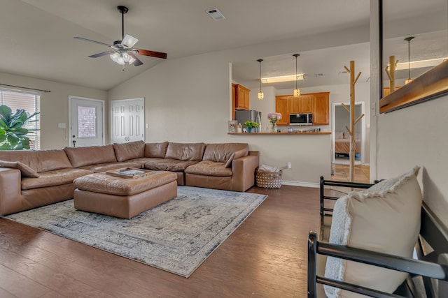 111 Ladonna Ct, Decatur, TX 76234 - living area with vaulted ceiling, ceiling fan, and wood finished floors