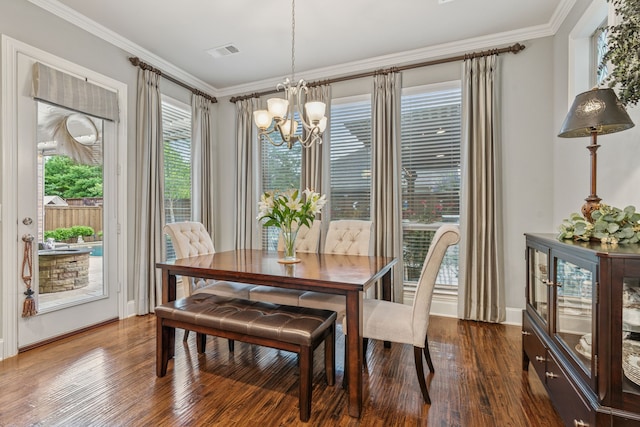 3308 Linkwood, The Colony, TX 75056 - dining space featuring a chandelier, dark wood finished floors, plenty of natural light, ornamental molding, and baseboards