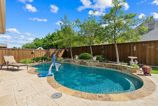 3308 Linkwood, The Colony, TX 75056 - view of swimming pool with a patio area and a fenced backyard