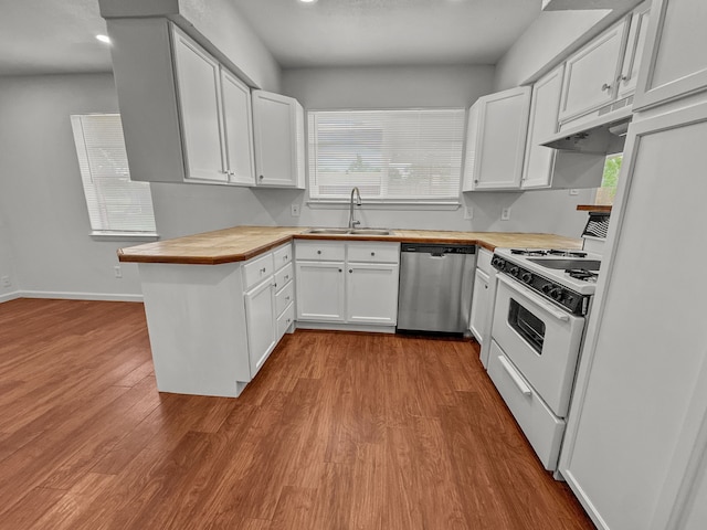 3837 Finley Rd, Irving, TX 75062 - kitchen featuring dishwasher, a sink, white stove, under cabinet range hood, and wood finished floors