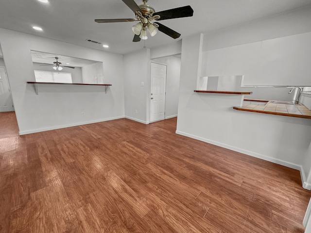 3837 Finley Rd, Irving, TX 75062 - unfurnished living room with ceiling fan, wood finished floors, recessed lighting, and baseboards
